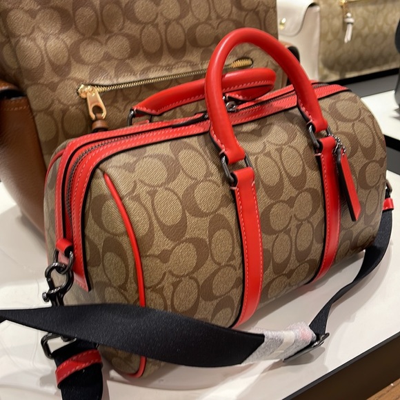 Coach men's Venturer Crossbody 27 In Colorblock Signature Canvas
QB/Khaki/Miami - Picture 8 of 16